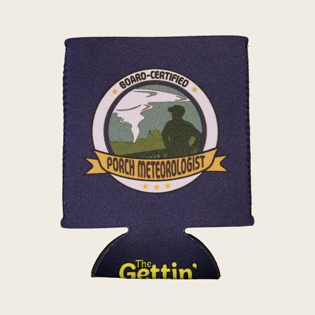 Navy can cooler with a graphic of a man watching a tornado in the distance, with the text "BOARD-CERTIFIED PORCH METEOROLOGIST"