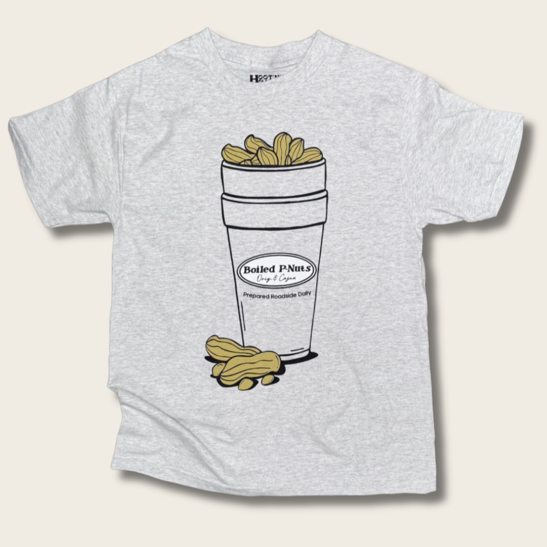 A light heather gray t-shirt featuring a graphic illustration of a styrofoam cup filled with peanuts and a few loose peanuts on the front, set against a light beige background.